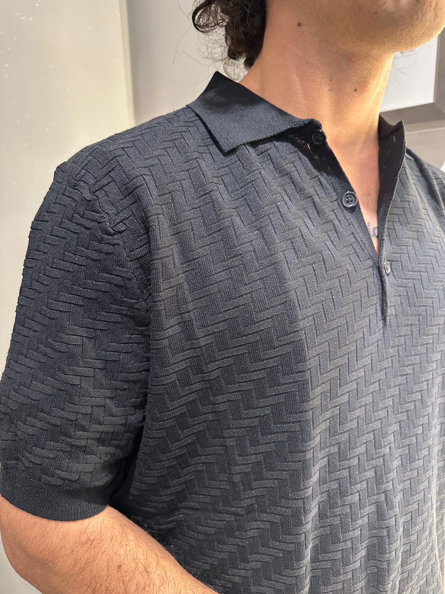 POLO IN MAGLIA OPERATA IN MISTO VISCOSA NERA
