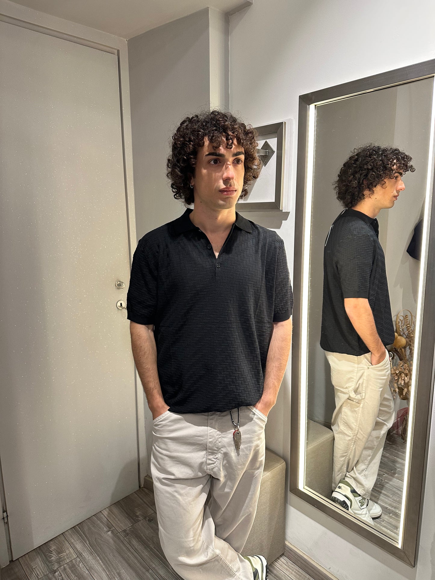 POLO IN MAGLIA OPERATA IN MISTO VISCOSA NERA