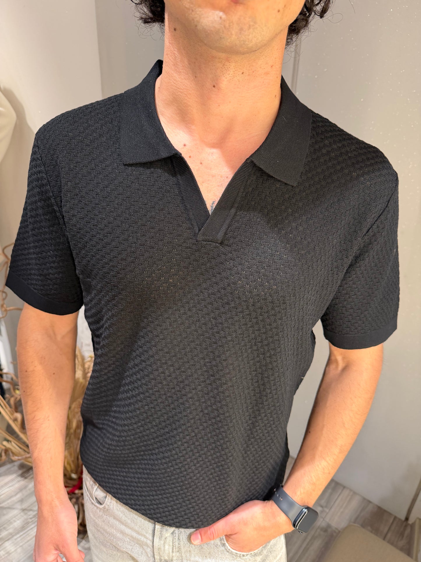 POLO IN MAGLIA CON PATTERN IN RILIEVO NERA