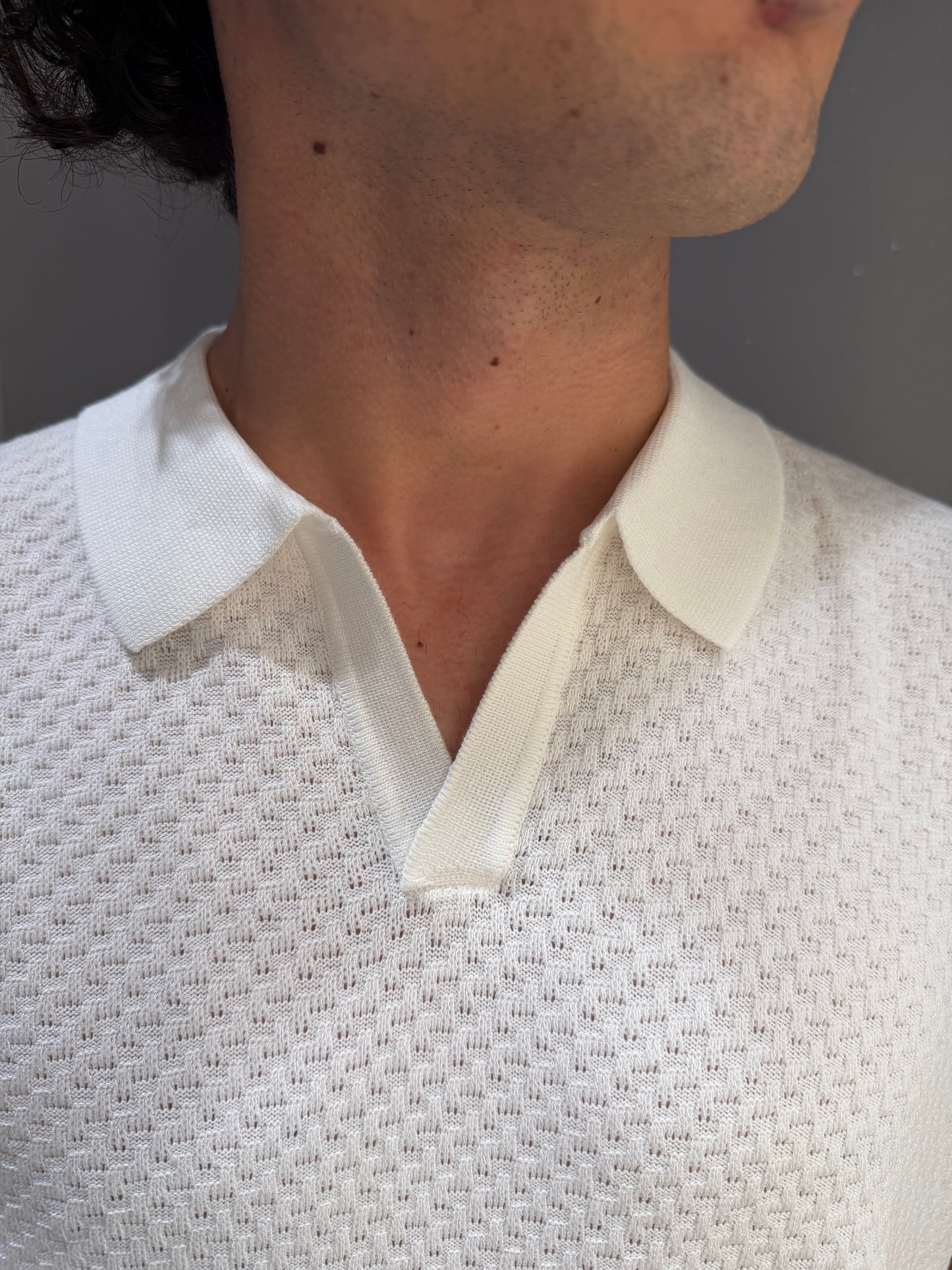 POLO IN MAGLIA CON PATTERN IN RILIEVO BIANCA