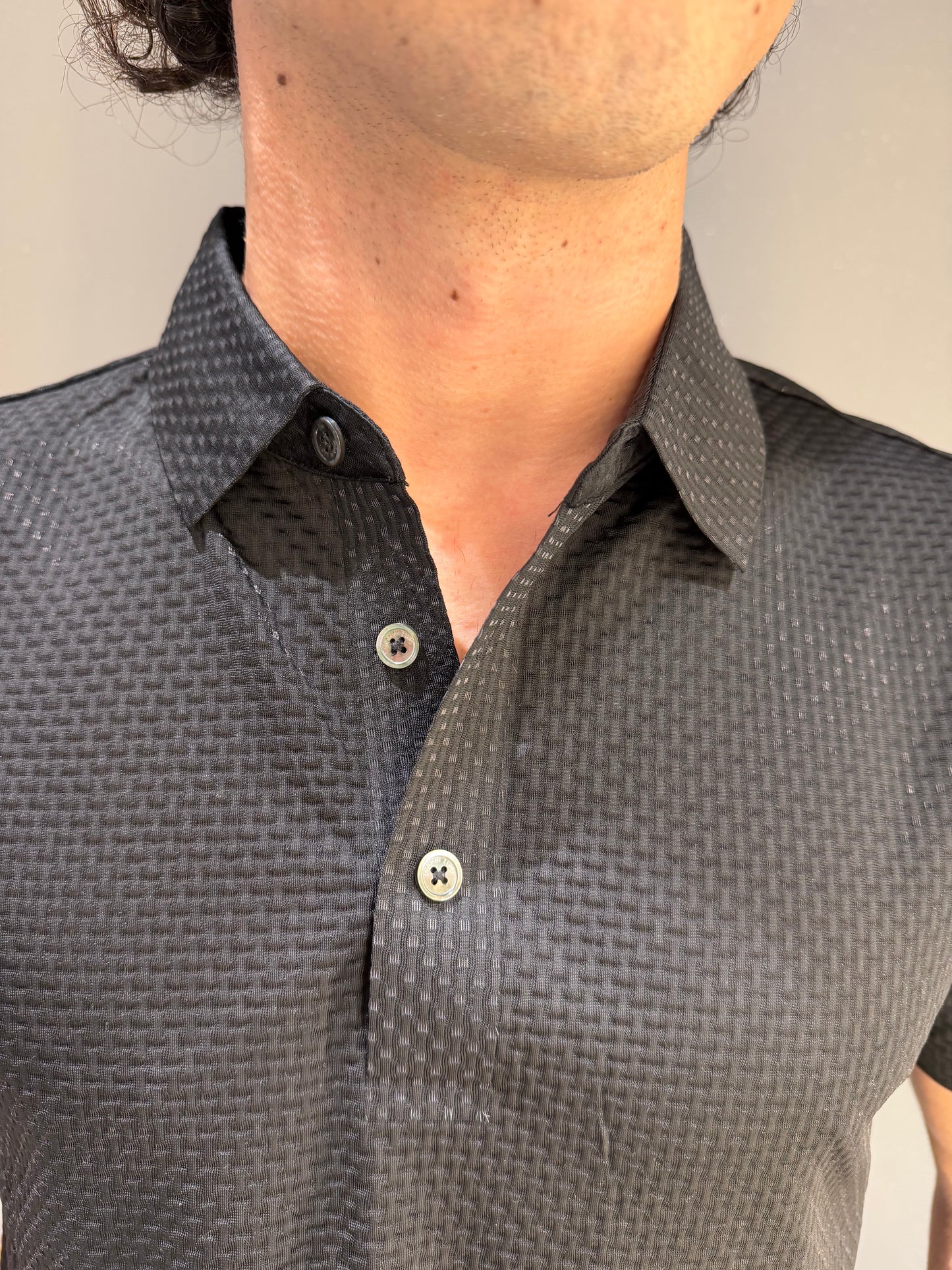 POLO NO STIRO TEXTURIZZATA NERA