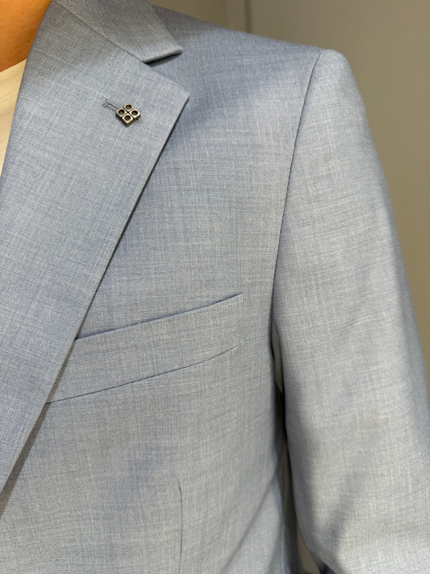 ABITO MONOPETTO IN POLIVISCOSA CELESTE MELANGE